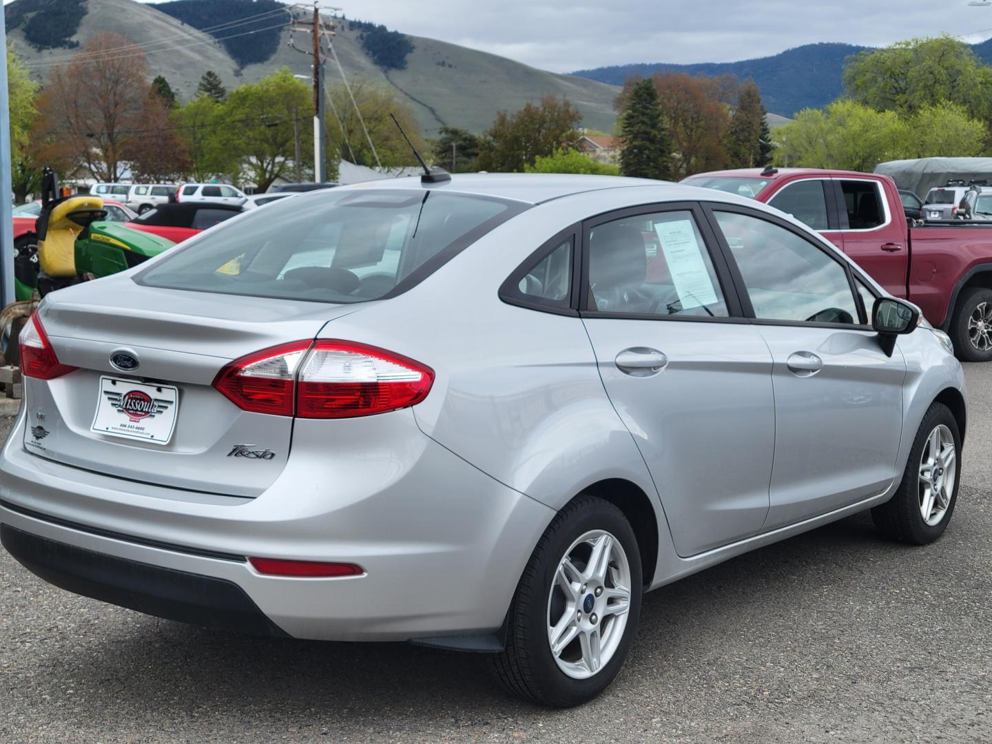 2019 Silver Ford Fiesta SE Sedan (3FADP4BJ2KM) with an 1.6L L4 DOHC 16V engine, Automatic transmission, located at 450 N Russell, Missoula, MT, 59801, (406) 543-6600, 46.874496, -114.017433 - Great little Economy Car in Very Good Condition. Low Miles. Automatic Transmission. Air Conditioning. Heated Seats. Power Windows. Cruise. Tilt. Backup Camera. - Photo#1